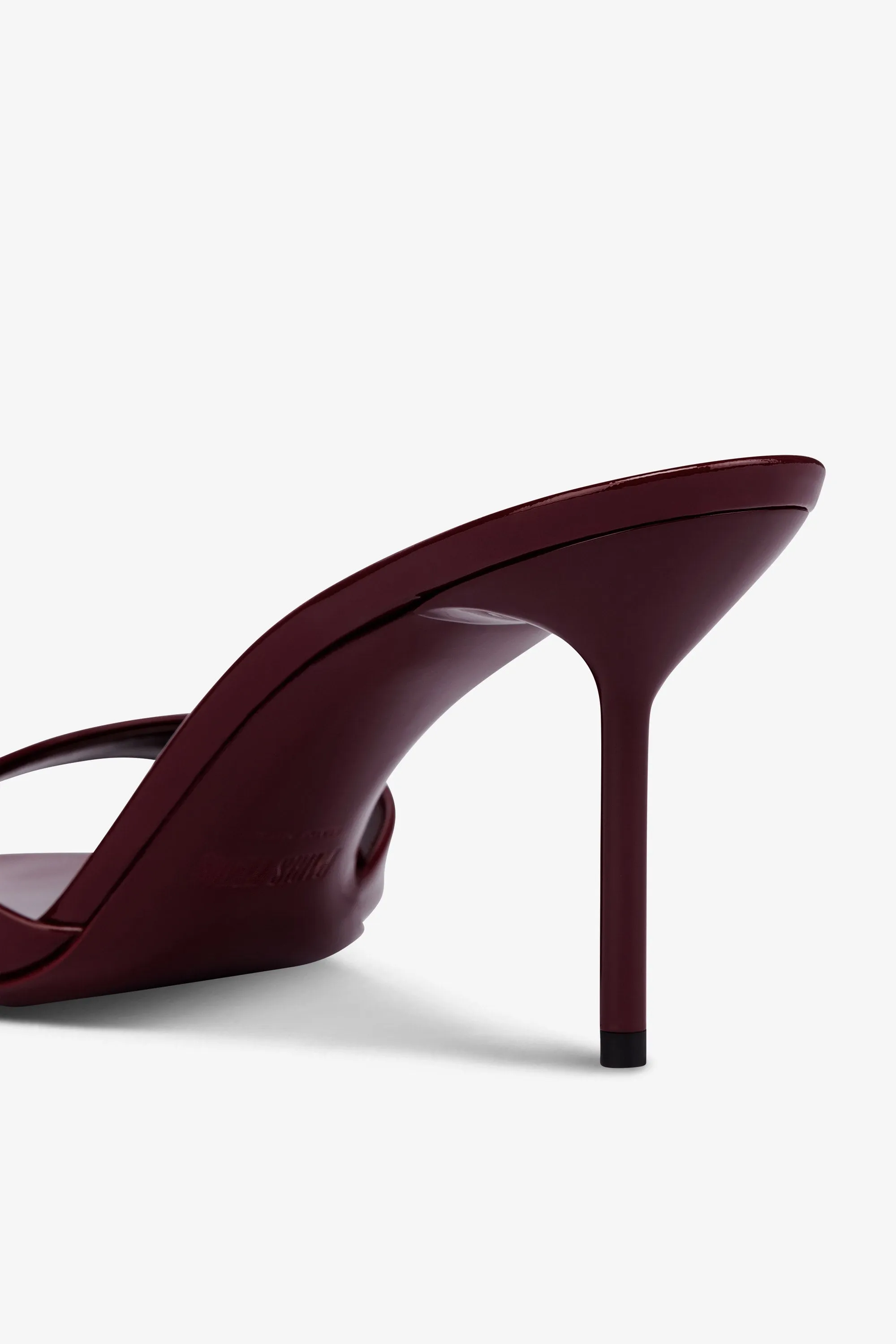 Almond-toe mules in patent rouge noir leather