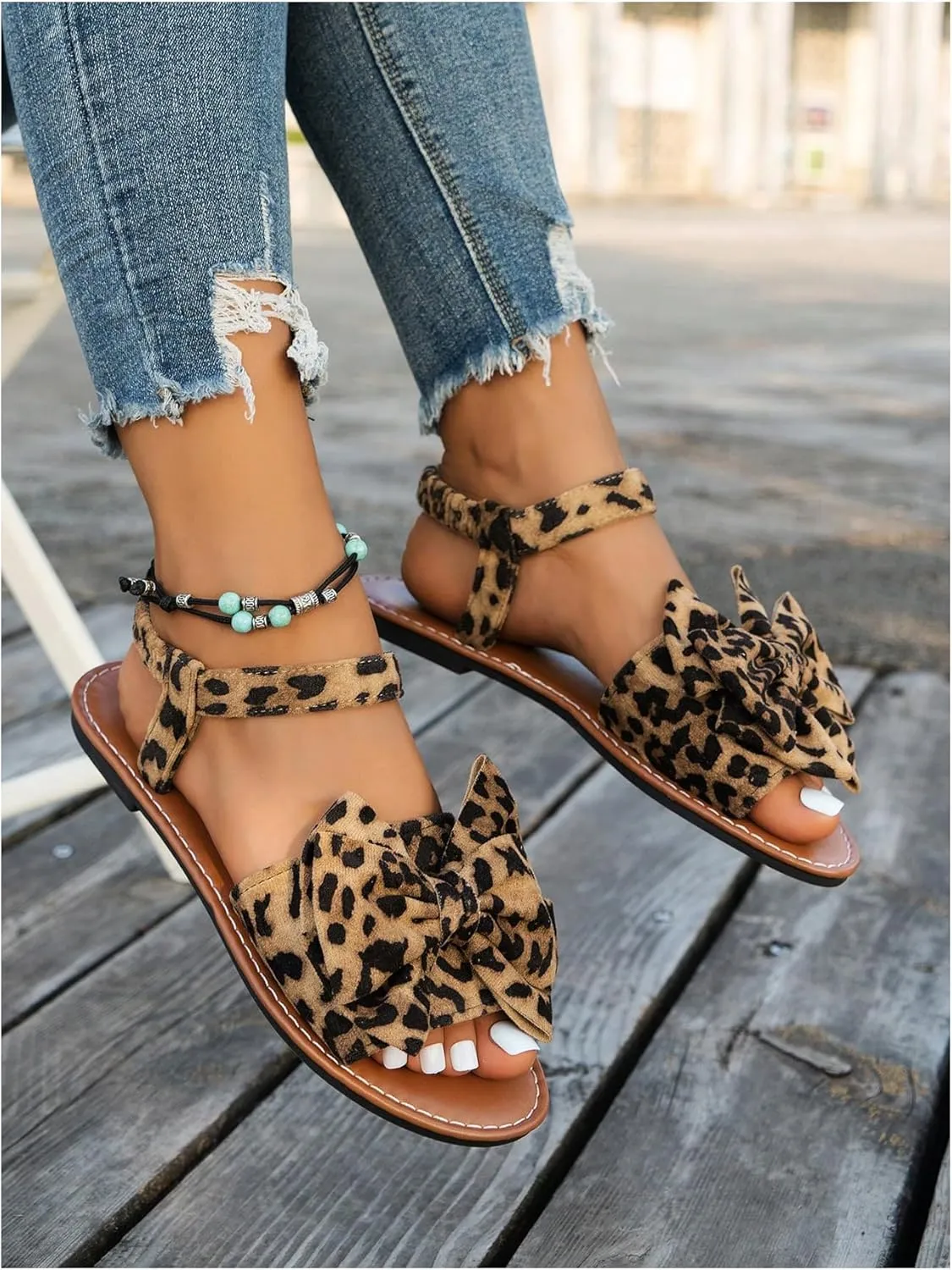 GORGLITTER Women's Ankle Strap Bow Sandals Criss Cross Open Toe Bowknot Dressy Beach Flat Sandals 2025