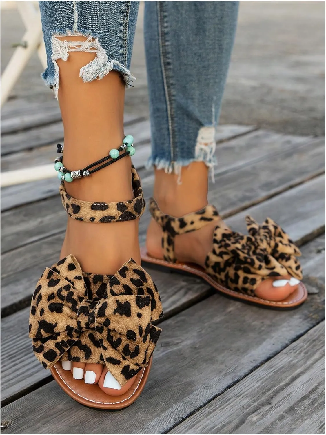 GORGLITTER Women's Ankle Strap Bow Sandals Criss Cross Open Toe Bowknot Dressy Beach Flat Sandals 2025
